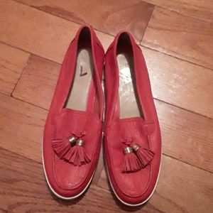 Michael Kors red tassel slip on sneakers